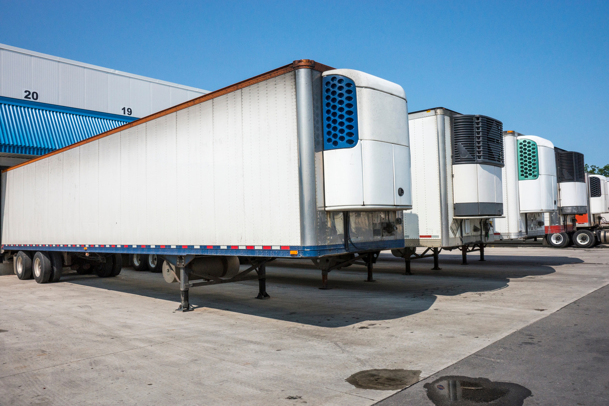 Refrigerated truck trailers at a distribution warehouse